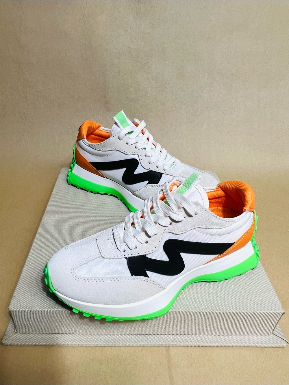 Steve Madden White Sneakers with Neon Green Sole, Orange Lining and Black Accent